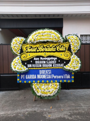 Papan Bunga Duka di Piyaman